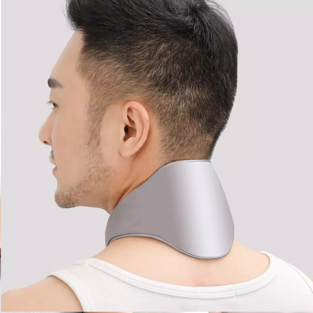 C10 Graphene Heated Silk Neck Strap: man wearing the gray neck strap from the rear.