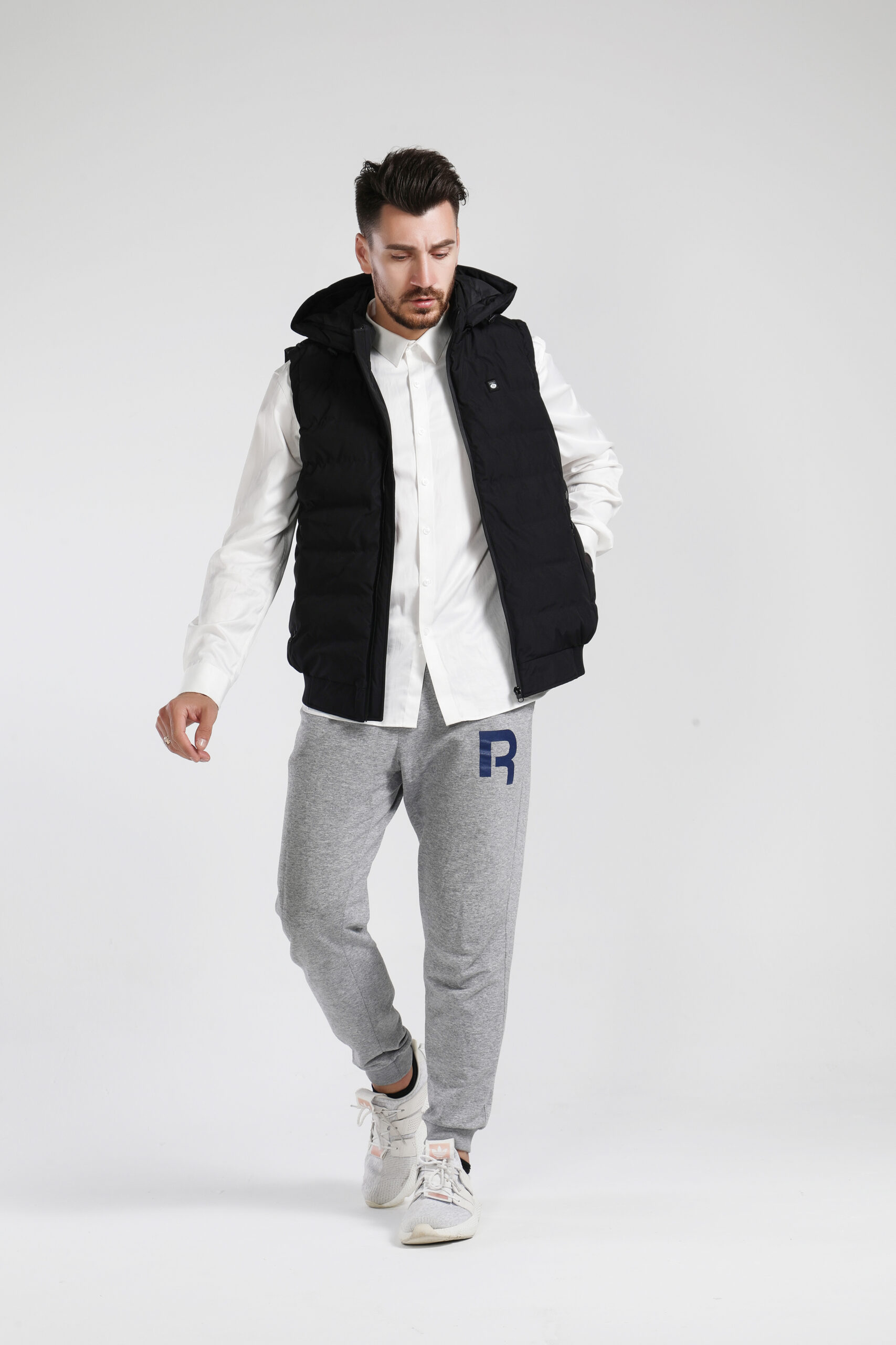 J10 Graphene Heated Casual Vest: man wearing the vest, full-length front view.