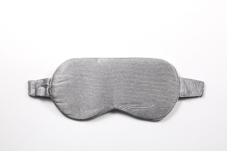 E10 Graphene Heated Silk Eye Mask: gray silk mask front view.