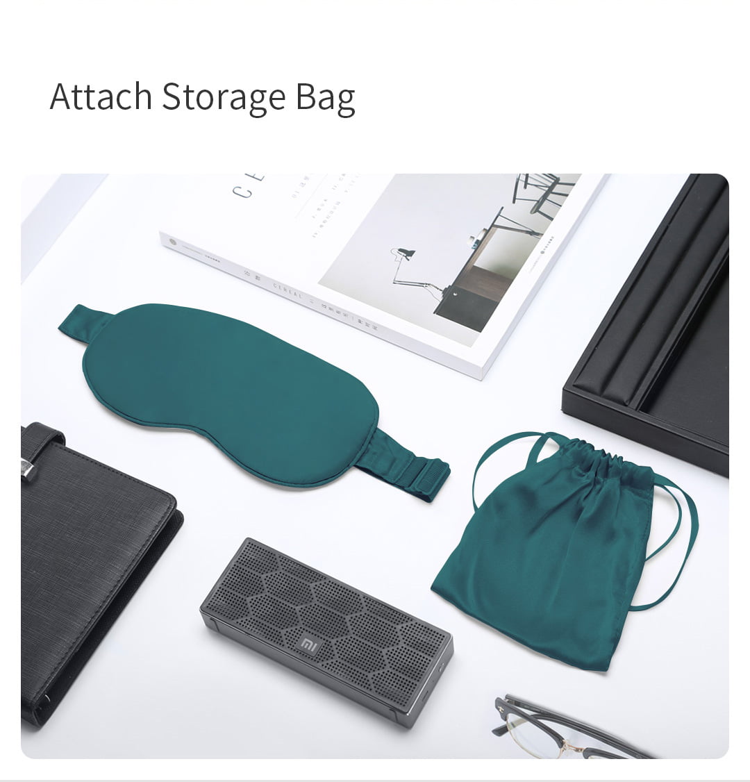 E10 Graphene Heated Silk Eye Mask: green mask and matching storage pouch.