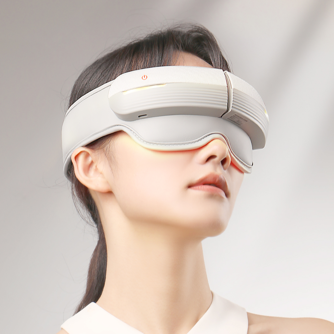 Head and eye massager shown on a user