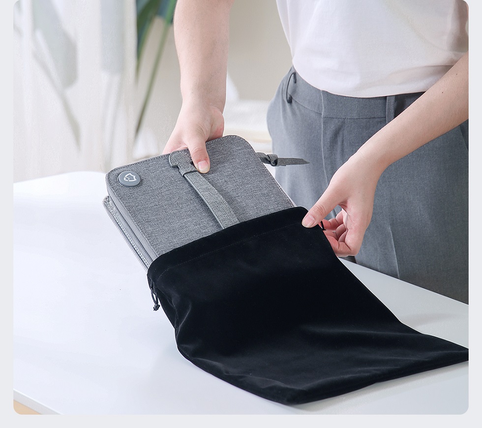 Gray foldable UV disinfection bag packed for travel