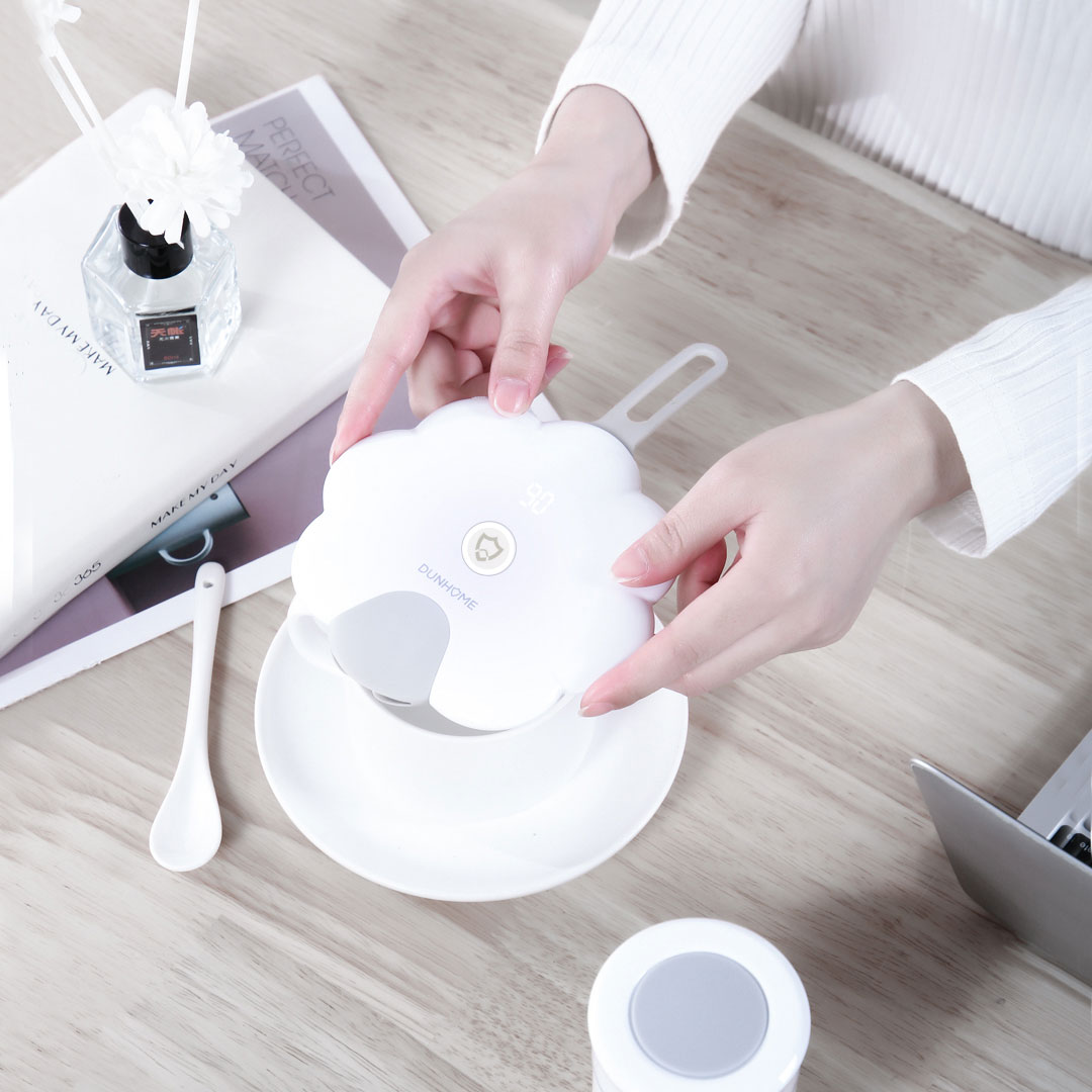 UV disinfection cover placed over a bowl