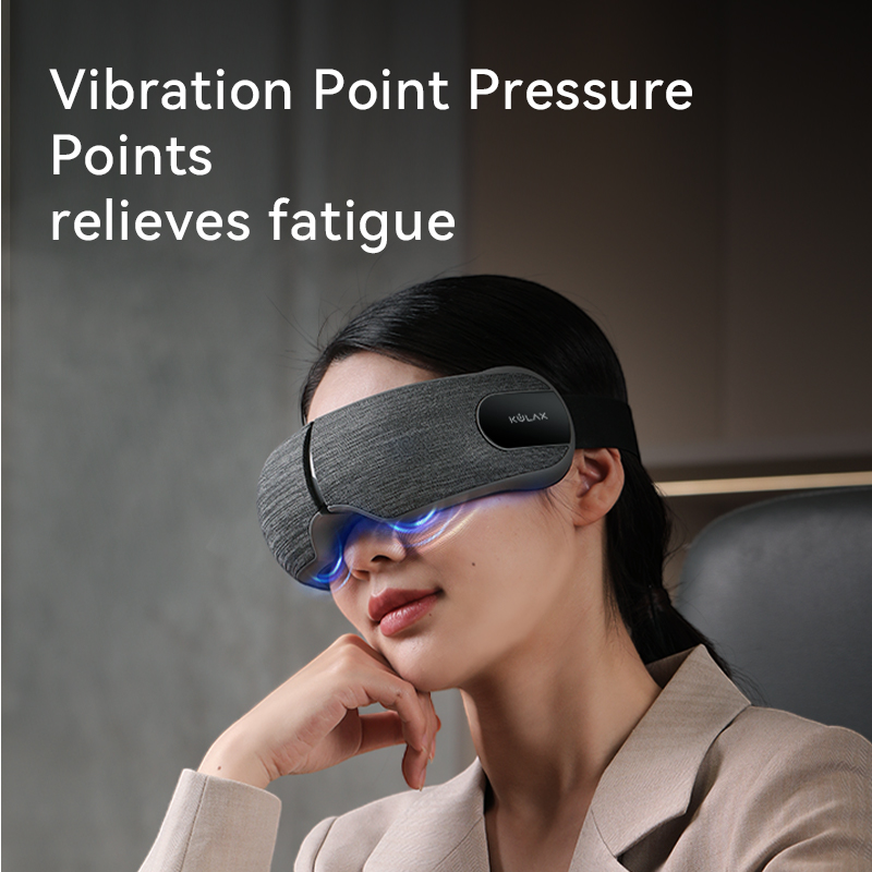 Airbag Eye Massager: woman using the mask while seated.