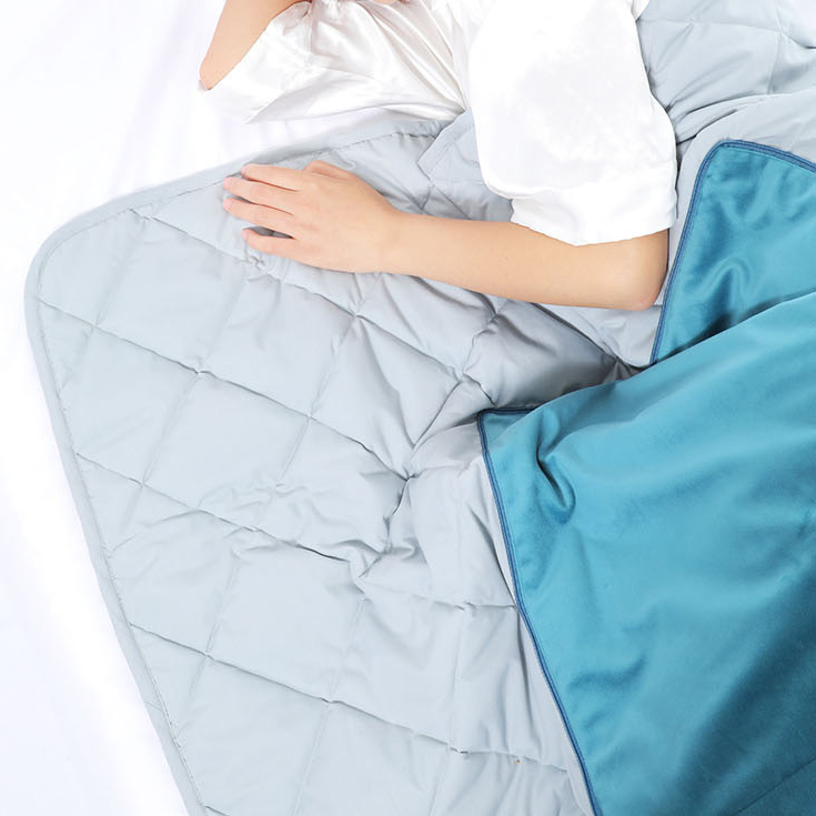 Graphene heated pillow blanket used while resting