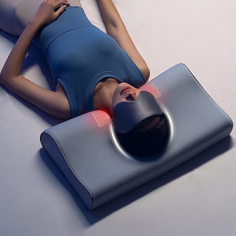 Graphene Smart Sleep Pillow: woman resting face up on the pillow.