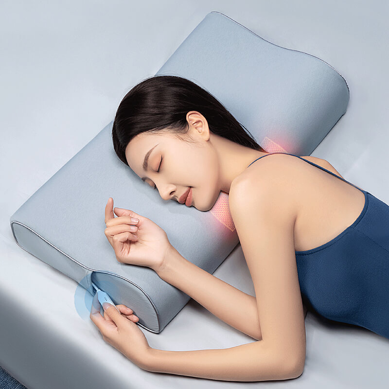 Graphene Smart Sleep Pillow: woman resting on her side.