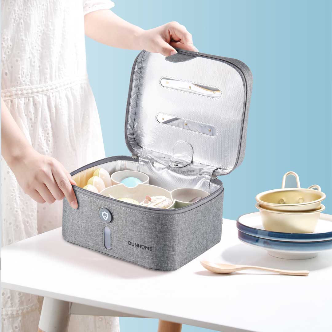 Gray UV disinfection box holding tableware