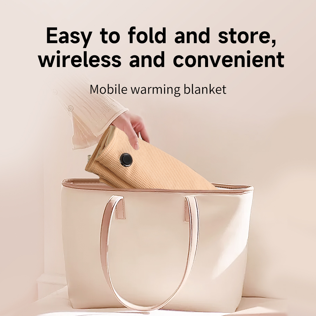 Graphene Heated Shoulder Wrap: folded wrap placed in a tote bag.