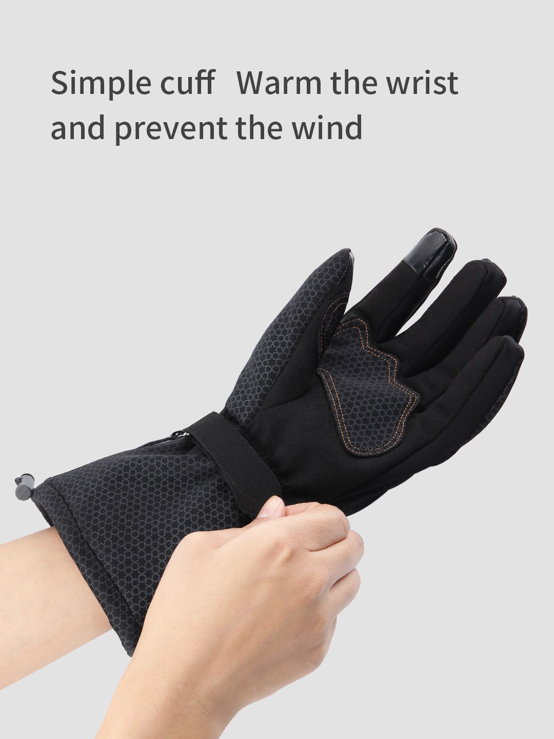 X20 Electric Heated Gloves: wrist cuff being adjusted.