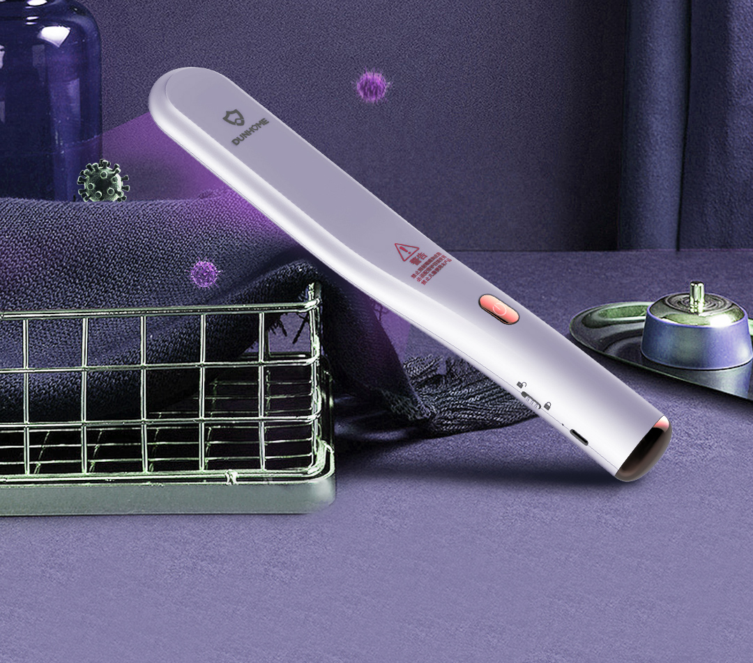 UVC sterilization wand operating on a tabletop