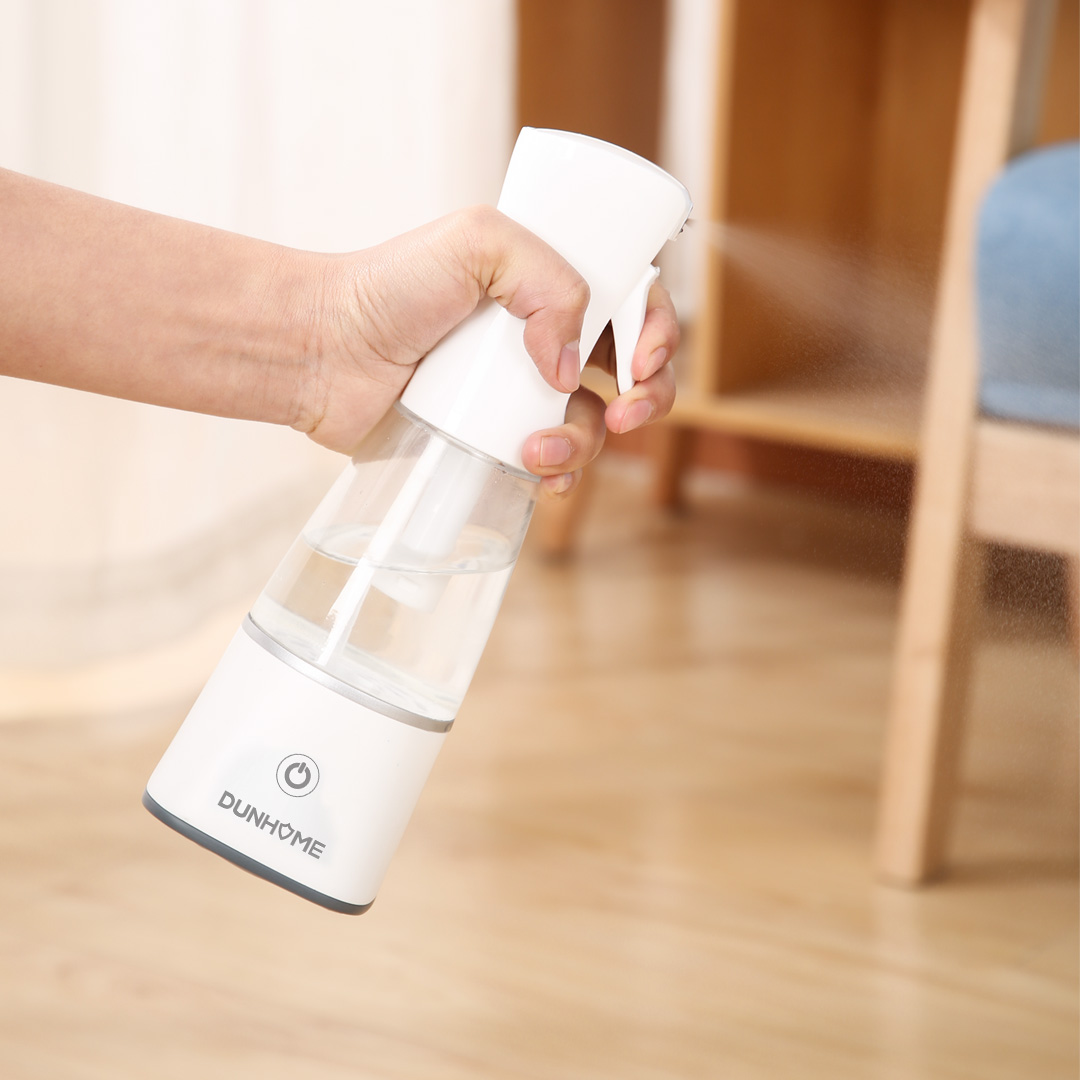 Disinfectant generator spraying a tabletop surface