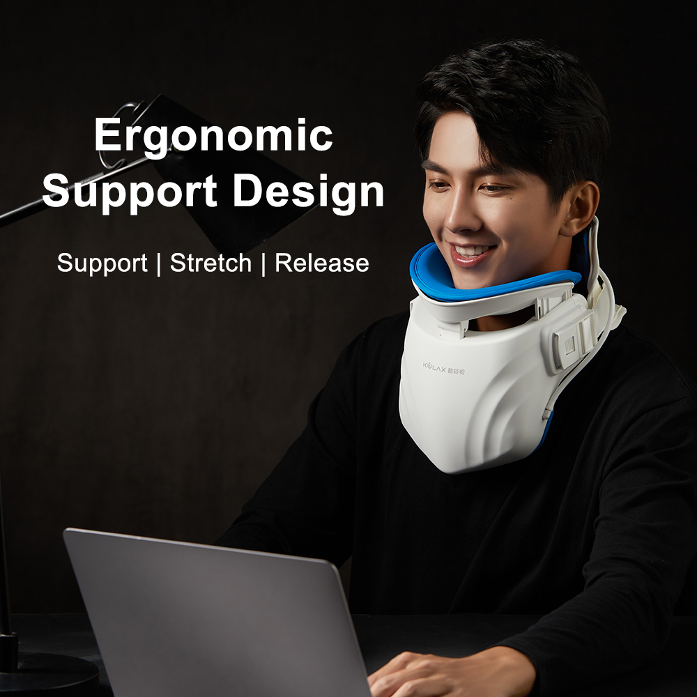 Graphene Motorized Neck Immobilizer: man wearing the support while using a laptop.