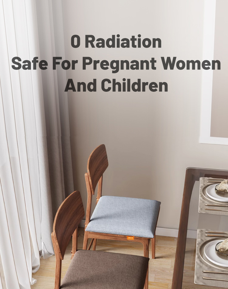 Gray seat cushion positioned on a wooden chair