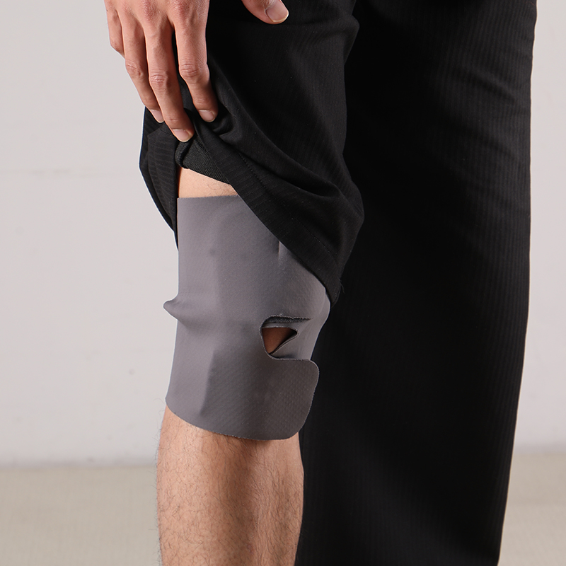 EMS Lightweight Knee Brace: brace worn under rolled-up clothing.