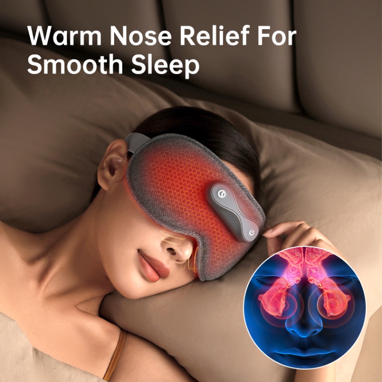 Graphene Heated Nasal Comfort Eye Mask: woman resting with the mask on a pillow.