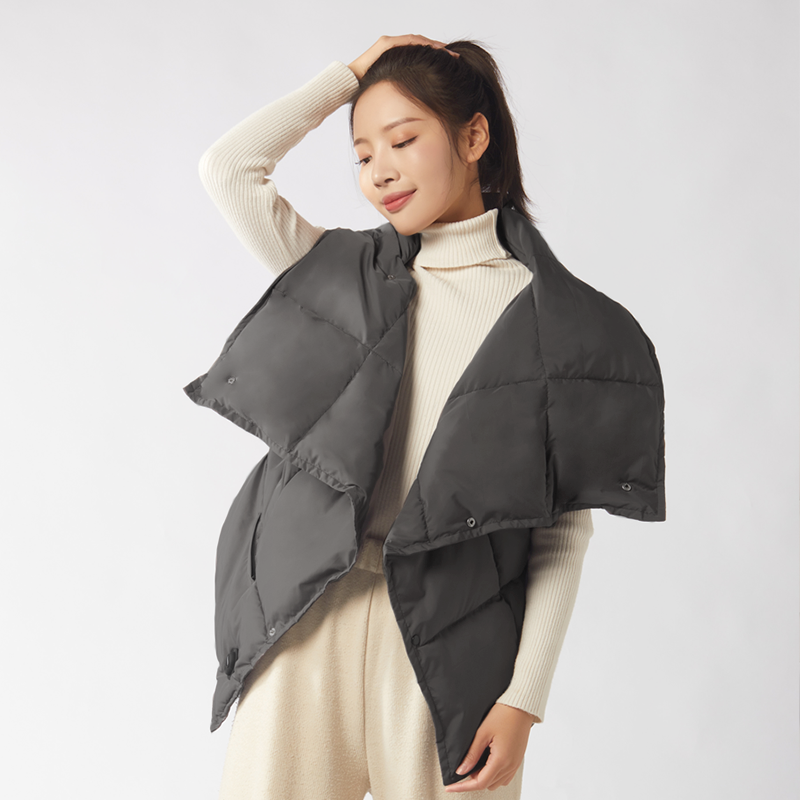 Multifunctional Graphene Heated Down Wrap: woman wearing the wrap as a shawl.
